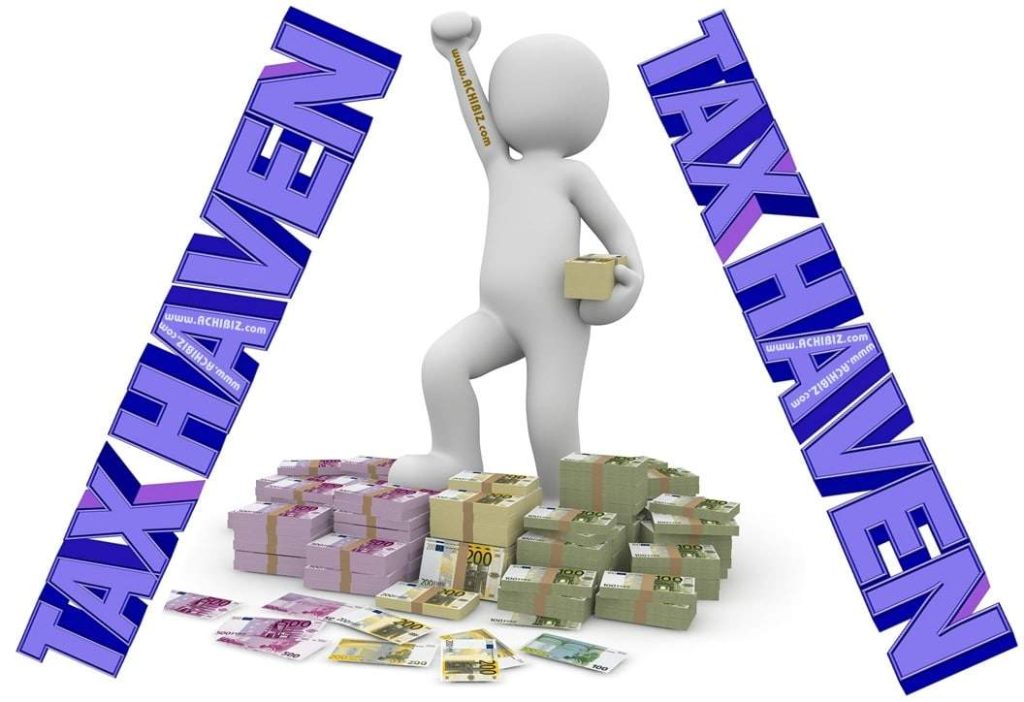 Man-Standing-On-Currencies-Tax-Haven